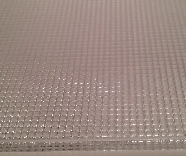 Sheet diffuser with a perpendicular grid of deep TIR channels